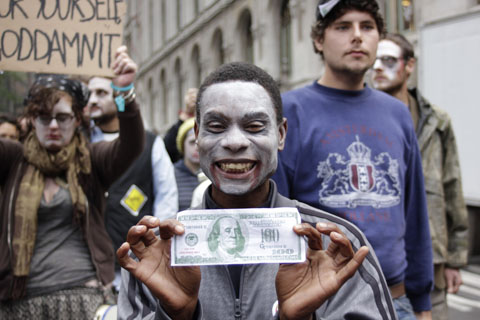 Occupy Wall Street protester in zombie costume